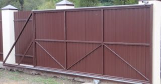 Купить откатные ворота из профнастила Ялуторовск, цена от 1753 руб.